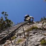 Auf der Leiter im Klettersteig