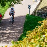 Mountainbaiker auf Bahntrasse Fleimstalbahn